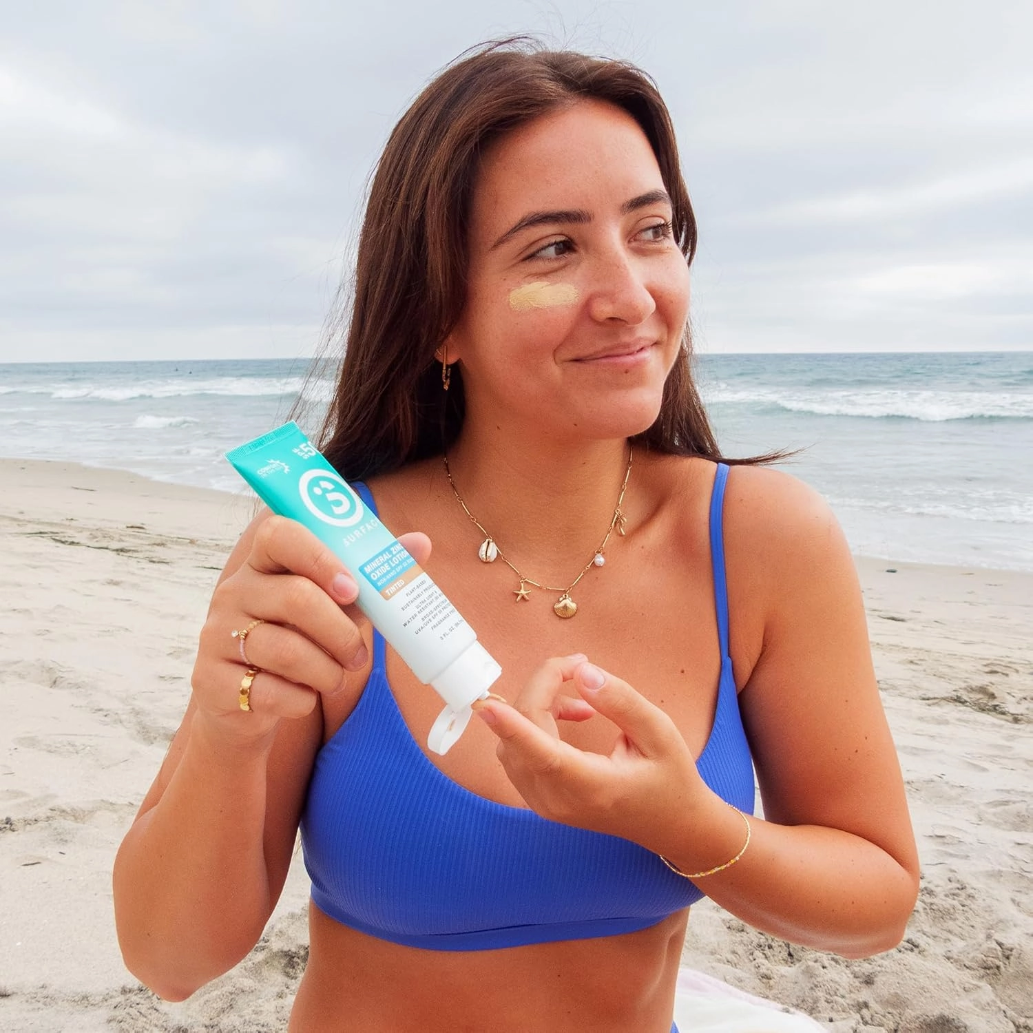 Surface SPF50 mineral sunscreen lotion, reef friendly with non-nano zinc oxide, broad spectrum UVA/UVB protection, water resistant for 80 minutes, cruelty free, non-greasy, tinted, travel size, 3oz